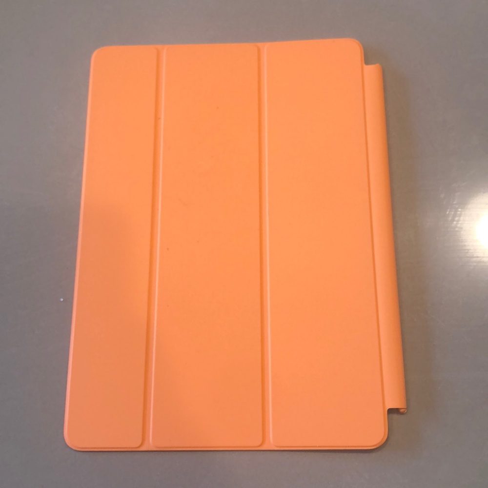 Brand new orange Apple iPad Air case. Never used!